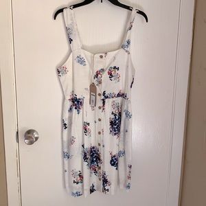 True Craft floral mini dress with buttons down the front. Still with tags